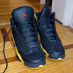 Black and Yellow Jordan 13s